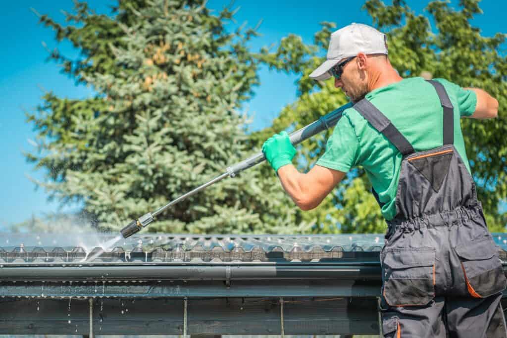 cleaning the sides of a roof