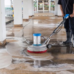aasian-worker-cleaning-sand-wash-exterior-walkway-using-polishing-machine-and-chemical-or-acid-min
